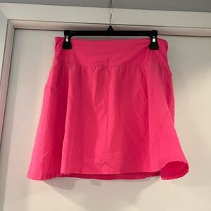 Bright pink skirt with shorts